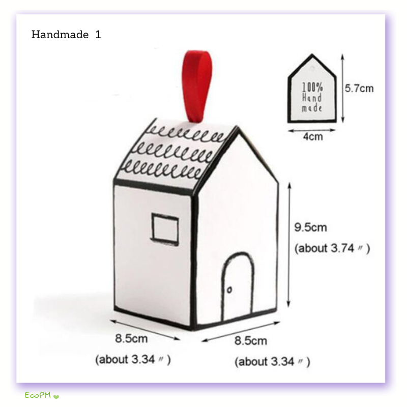 handcrafted-holiday-house-favor-box-20pcs.jpg A handcrafted white favor box designed as a quaint house with a red ribbon chimney, labeled '100% Handmade', ideal for holiday treats.