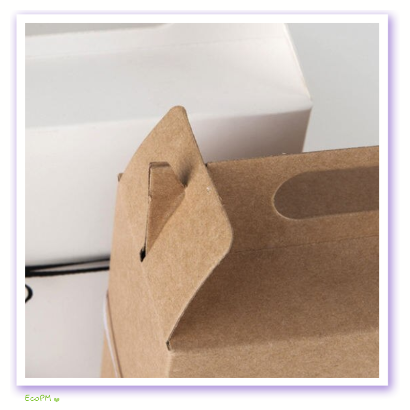 close-up-simplistic-elegance-kraft-favor-box.png Close-up view of a Simplistic Elegance Kraft Favor Box showcasing the natural texture and crafted handle detail.
