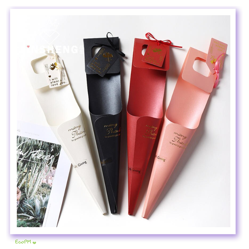 chic-flower-bouquet-bags-collection.png Assorted collection of chic flower bouquet bags in red, pink, white, and black, ideal for stylish and eco-conscious gifting.