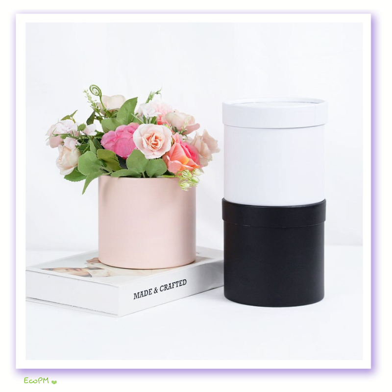 modern-flower-box-collection.png Modern collection of flower boxes in white, pink, and black, showcasing a minimalist design for stylish floral arrangements.