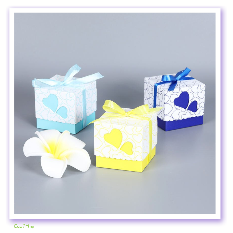 vibrant-heart-themed-favor-boxes-ribbons.png Colorful favor boxes with heart designs and matching ribbons, ideal for party gifts.