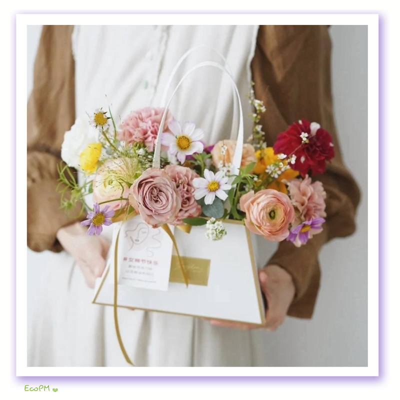 elegant-white-paper-flower-bag-held.png