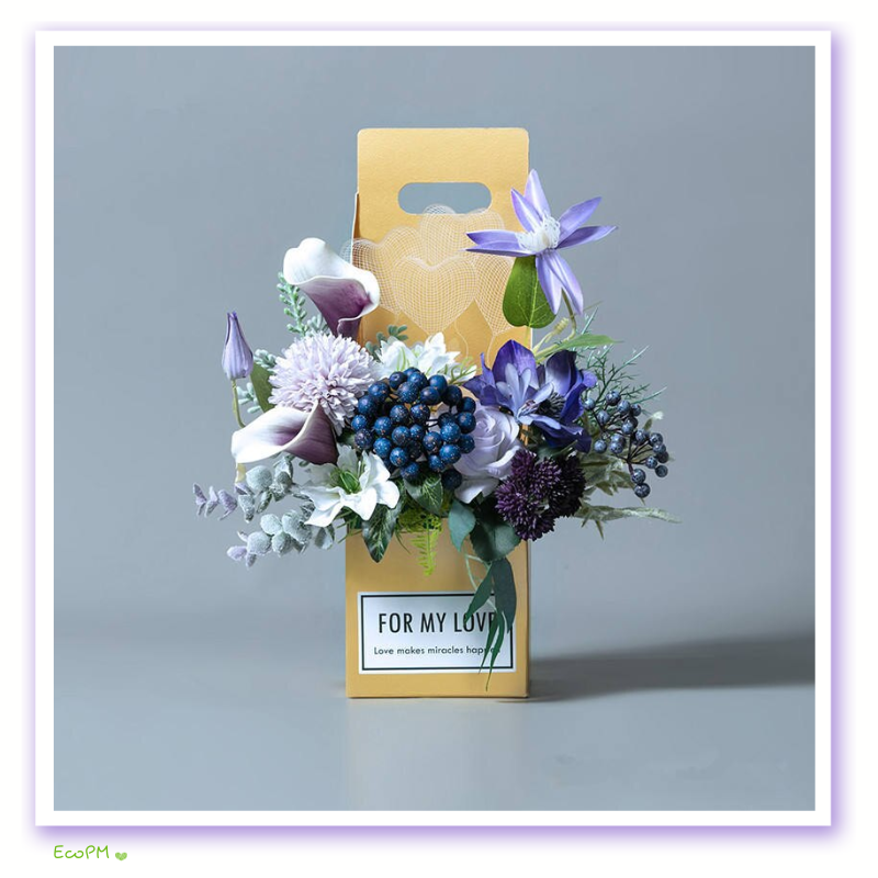 elegant-yellow-flower-gift-bag.png A yellow flower gift bag with a diverse bouquet including blue hydrangea and purple flowers, tagged 'For My Love'.