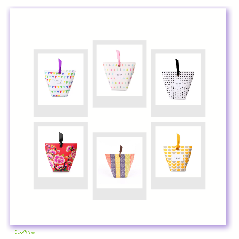 assorted-patterned-favor-boxes-collection.png A collection of six assorted patterned favor boxes with ribbons in a gallery wall style presentation.