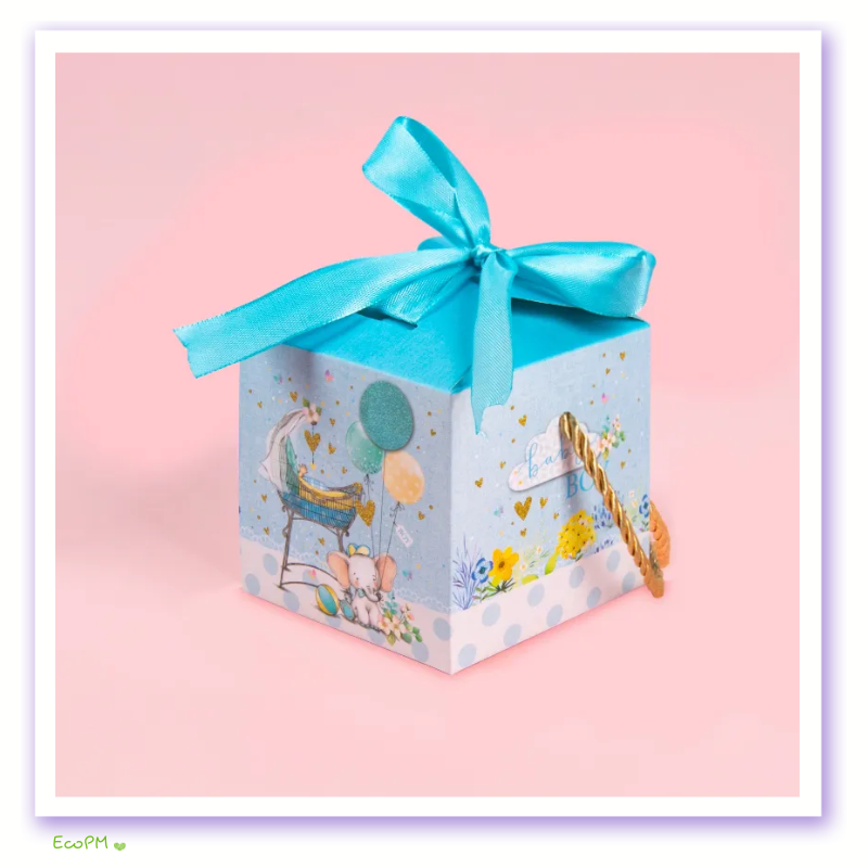 celebratory-baby-shower-favor-box-blue.png Baby shower favor box in a soft blue hue with a vibrant turquoise ribbon and cheerful baby-themed illustrations.