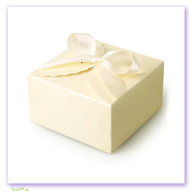 classic-cream-favor-box-with-satin-ribbon.png Elegant cream-colored favor box tied with a delicate satin ribbon, perfect for weddings and special events.