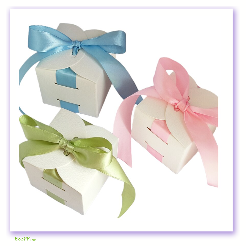 elegant-multicolor-ribbon-favor-box-collection.png Elegant favor boxes with pastel blue, pink, and green satin ribbons tied in bows, isolated on a white background.