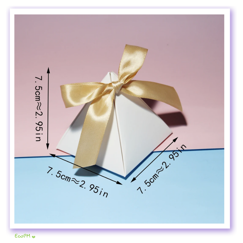 golden-ribbon-pyramid-gift-box.png Luxurious white pyramid gift box with a golden satin ribbon on a split pink and blue pastel background