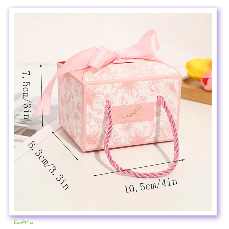 pink-floral-favor-box-with-satin-ribbon.png Elegant Pink Floral Favor Box with Satin Ribbon and Braided Handle