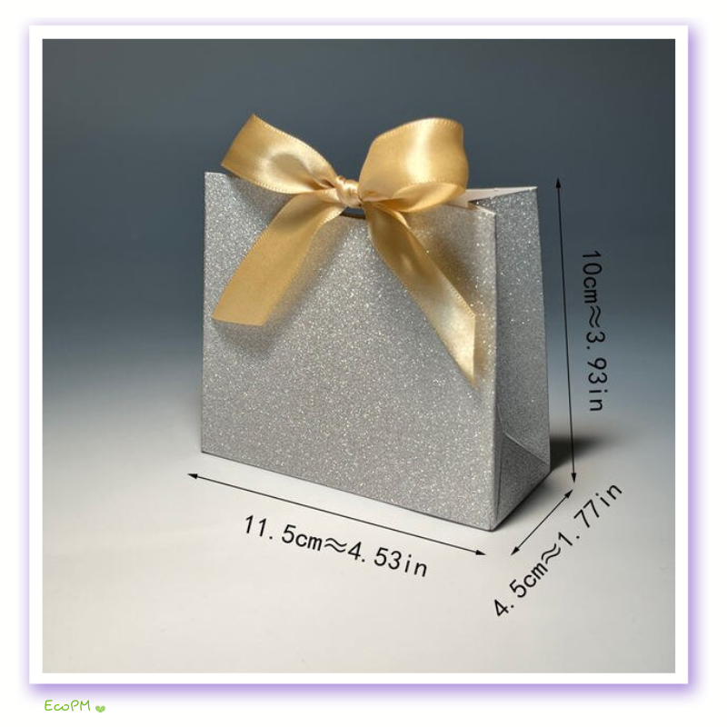 shimmering-silver-gift-box-with-golden-ribbon.png