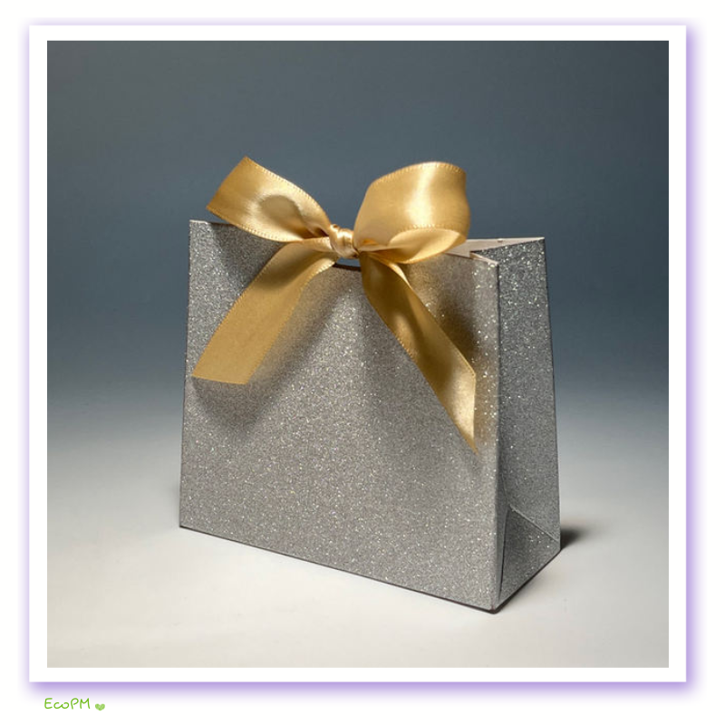 silver-gift-box-with-golden-ribbon.png