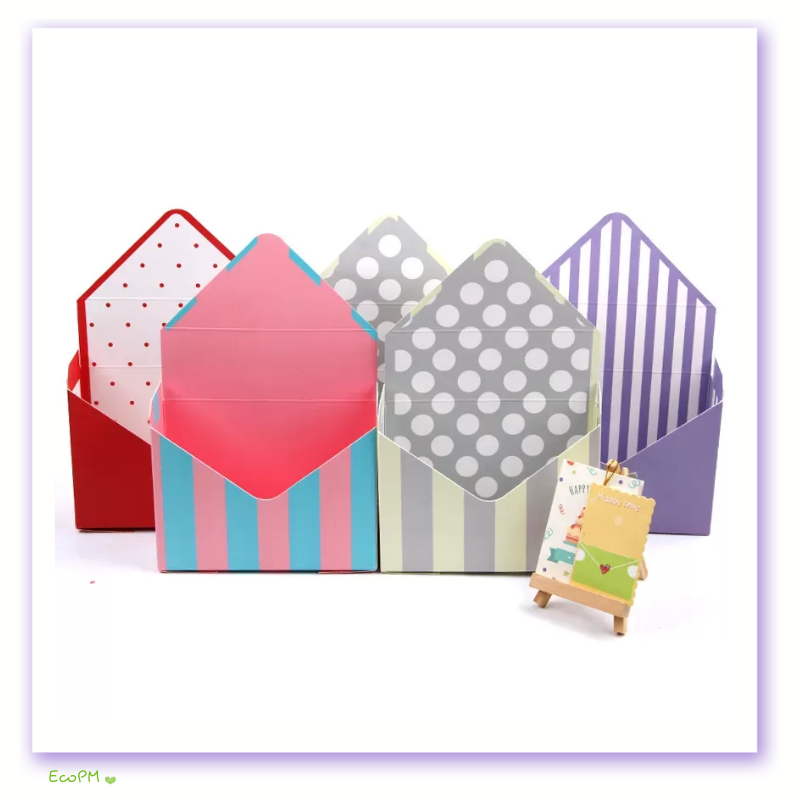colorful-striped-and-polka-dot-envelope-boxes.png Vibrant striped and polka-dot envelope gift boxes with a mini easel display
