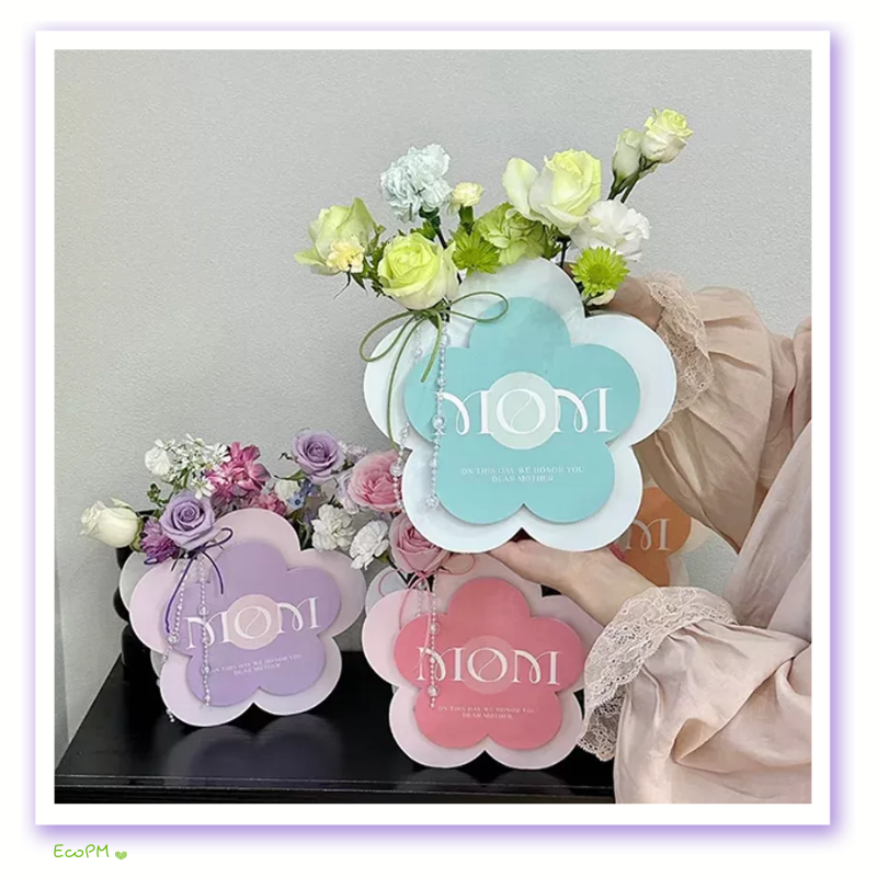 elegant-mothers-day-flower-card-set.png Elegant Mother's Day flower-shaped cards in various pastel shades displayed with a bouquet.