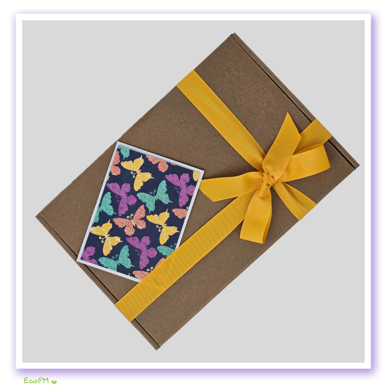 eco-friendly-gardeners-gift-box-top-view.jpg Eco-friendly gift box with yellow ribbon and butterfly greeting card.
