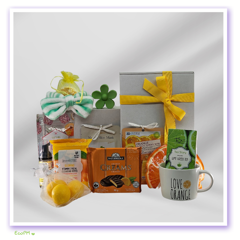 eco-friendly-orange-themed-gift-box.png Eco-friendly orange-themed gift box with skincare and snacks