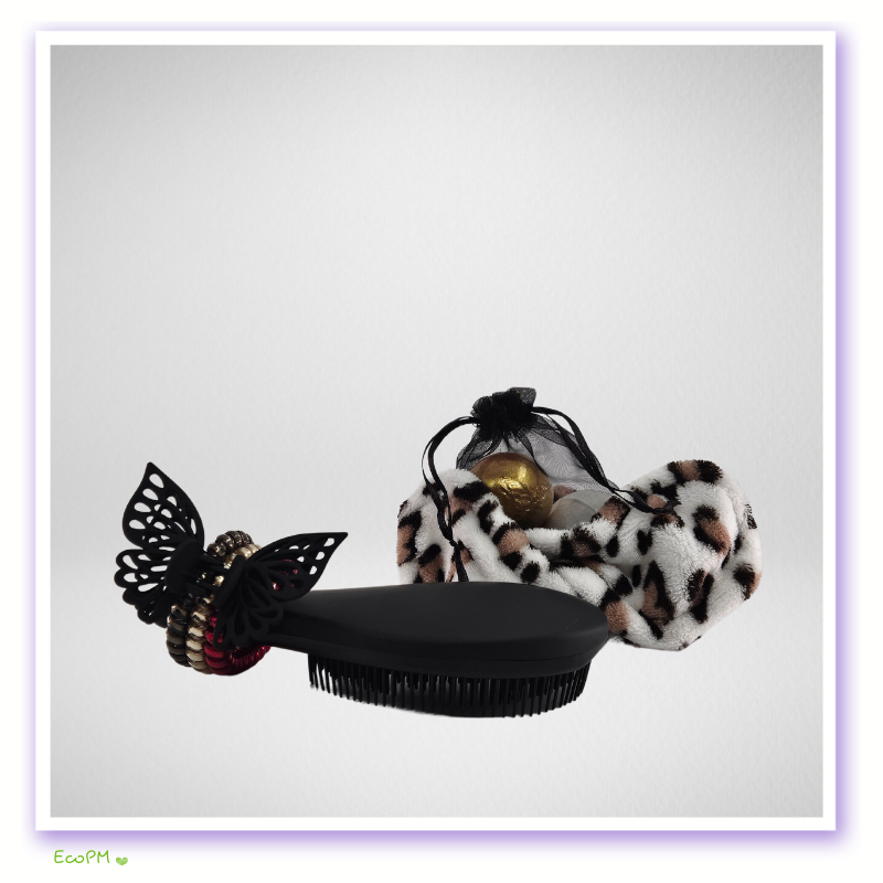 elegant-beauty-accessories-gift-set.jpg Elegant hair care set with butterfly hairbrush and leopard print scrunchies.