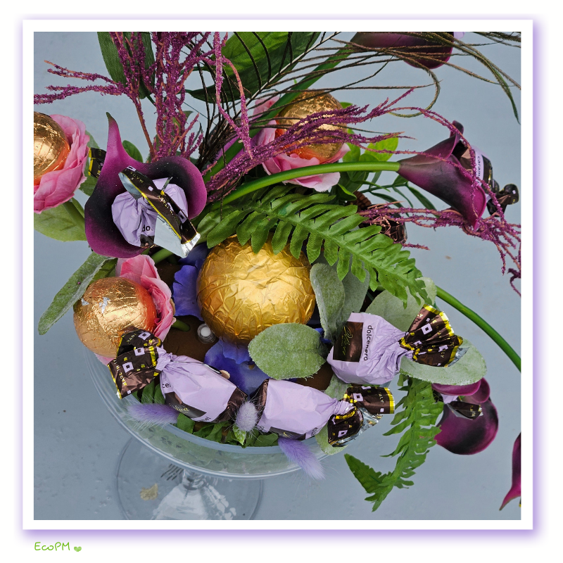 elegant-enchantment-chocolate-arrangement-detail.jpg Detailed view of the Elegant Enchantment Chocolate Arrangement with premium chocolates and decorative elements.