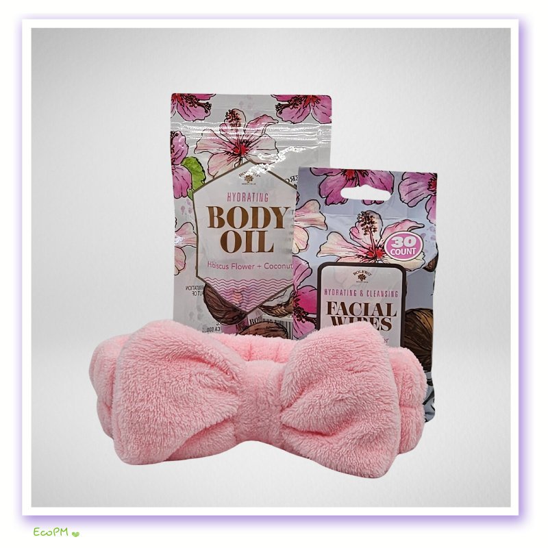elegant-pink-bliss-gift-box-spa-items.png Spa headband with hibiscus body oil and facial wipes.