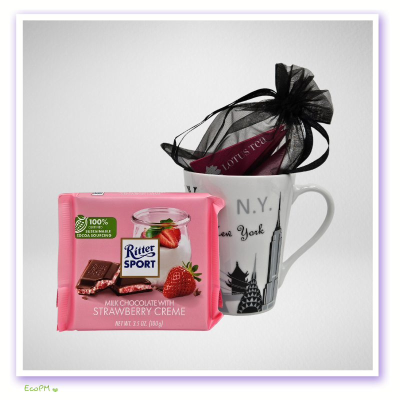 elegant-pink-bliss-gift-box-tea-chocolate.png Berry medley organic tea in a New York mug with strawberry cream milk chocolate.