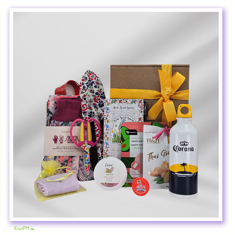 gardeners-retreat-box-items-displayed.jpg Assorted gifts inside a box including gardening supplies, spa items, and a decorative bottle.