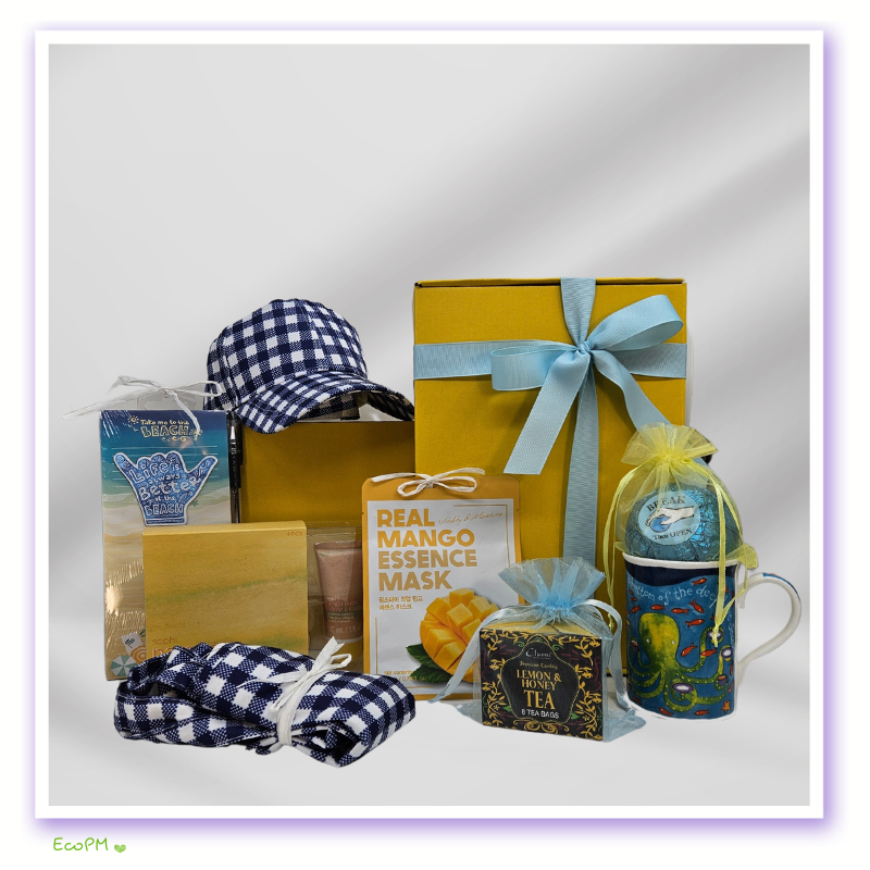 open-yellow-gift-box-summer-essentials.jpg Beach-themed gift set with cap, skincare products, and summer refreshments.