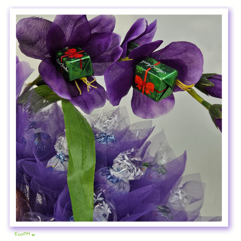 purple-elegance-chocolate-bouquet-flowers Detailed view of floral accents on the Purple Elegance Chocolate Bouquet