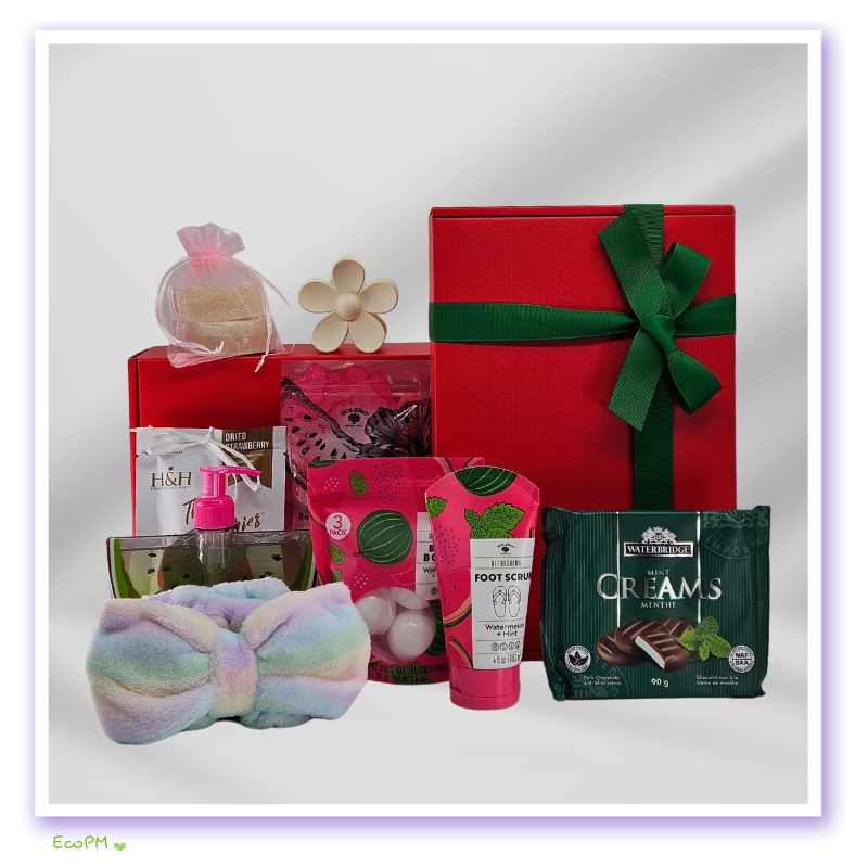 vibrant-red-elegance-gift-box-contents-visible.jpg Full gift set display with red box, personal care items, and treats.