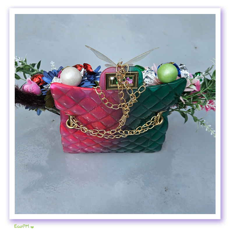 eco-party-floral-chocolate-bag-5.png Back view of eco-friendly floral bag with chocolates and greenery